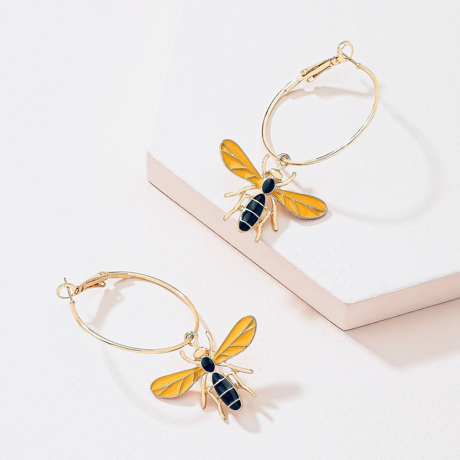 Bee charms on hoop in gold tone