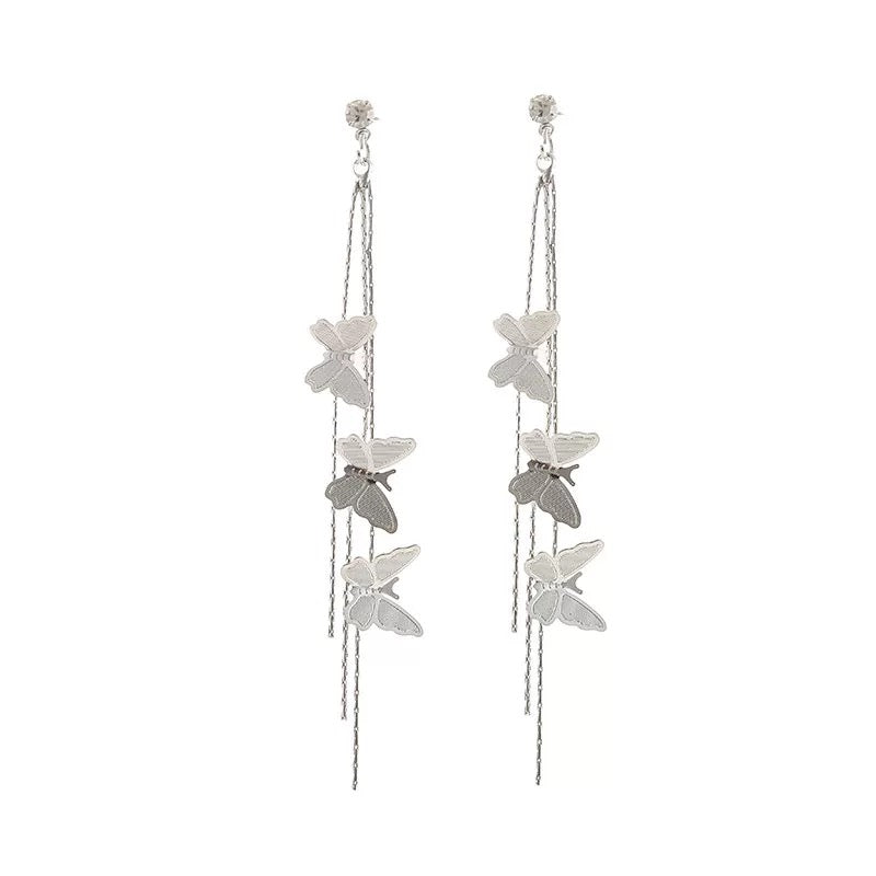 Long butterfly drop earrings in silver